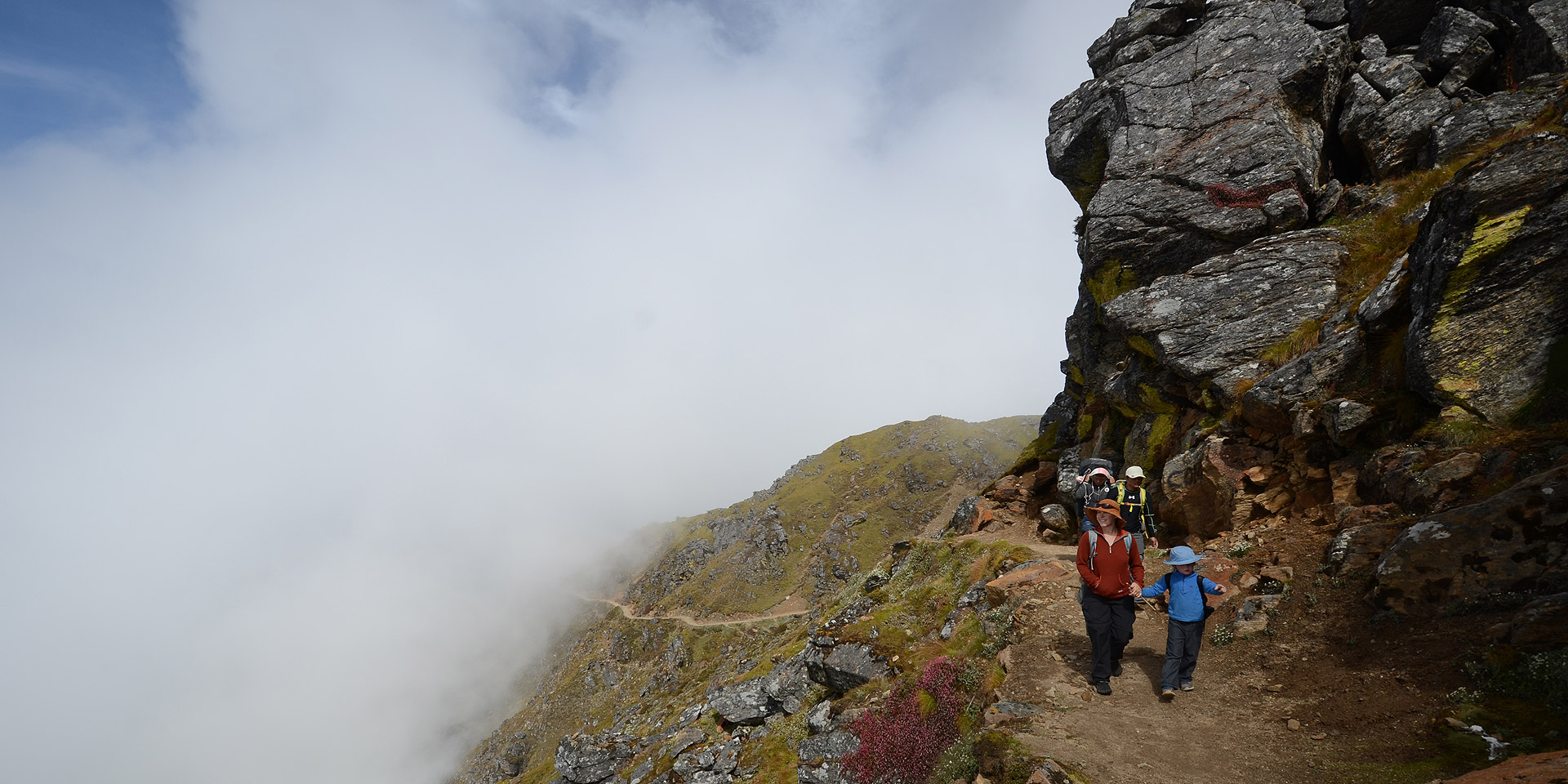 Trekkers on the trail from Gosainkunda to Laurabina in Nepal