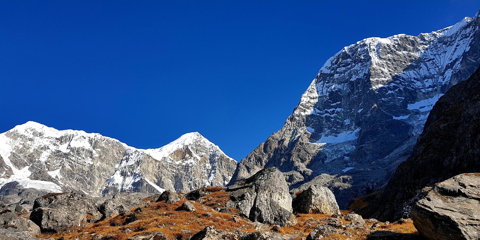The view of Numbur, Khatang and Karyolung Peaks from Saharsbeni, the base camp for visiting Dudh Kunda in Solu